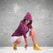 woman dancer wearing a hoodie