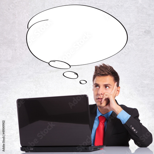 Photo: business man with blank bubble for his thoughts business man with blank bubble for his thoughts