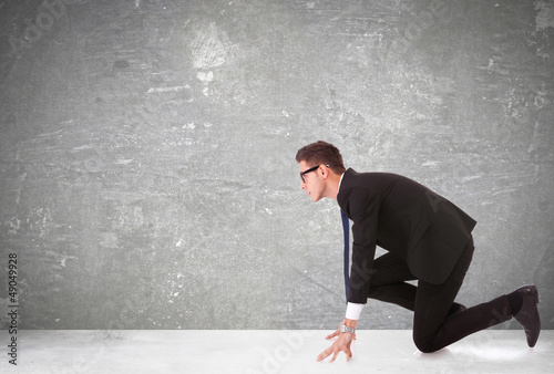 Photo: business man at the start of a competition business man at the start of a competition