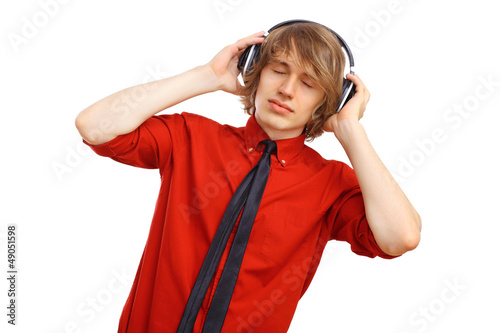 Photo: Happy smiling young man dancing Happy smiling young man dancing