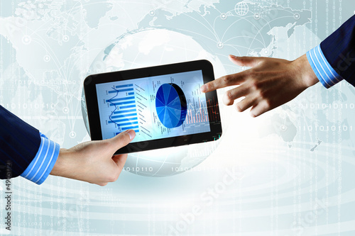 Photo: Modern computer technology in business Modern computer technology in business