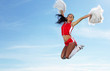 Young female cheerleader
