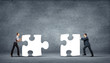 Piece of puzzle and business persons