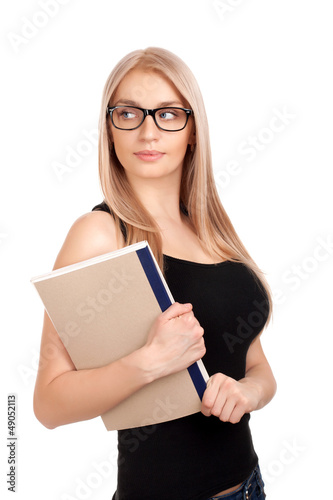 Photo: Student holding books Student holding books