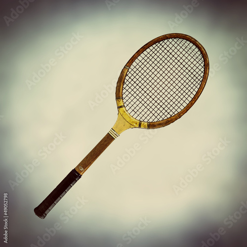 Photo: old fashioned wooden tennis racket old fashioned wooden tennis racket