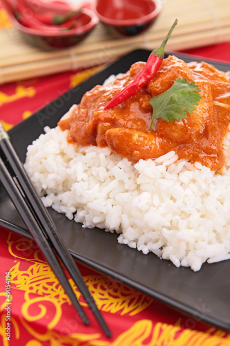 Photo: rice and red curry sauce rice and red curry sauce