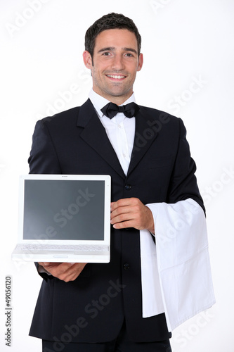 Photo: Waiter with computer Waiter with computer