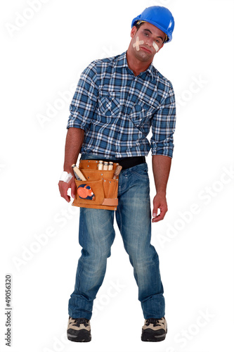Photo: An injured construction worker. An injured construction worker.
