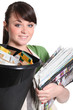 Young woman recycling paper