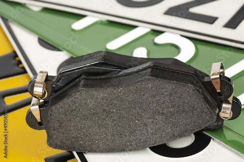 Photo: Brake pads and license plates Brake pads and license plates