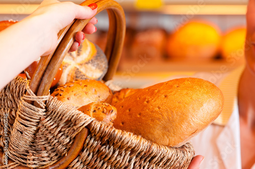 Photo: Salesperson with female customer in bakery Salesperson with female customer in bakery