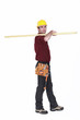 Labourer carrying a wooden plank