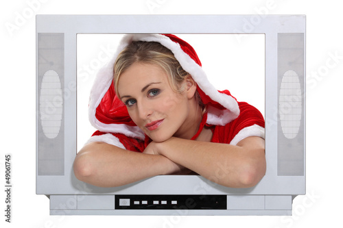 Photo: woman in a Santa Claus suit posing woman in a Santa Claus suit posing