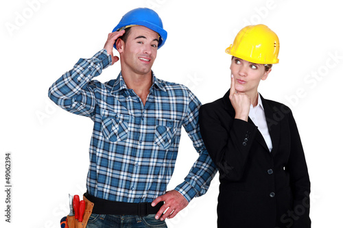 Photo: Architect flirting with builder Architect flirting with builder