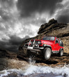 Offroad vehicle on the mountain terrain