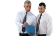 Businessmen discussing a document