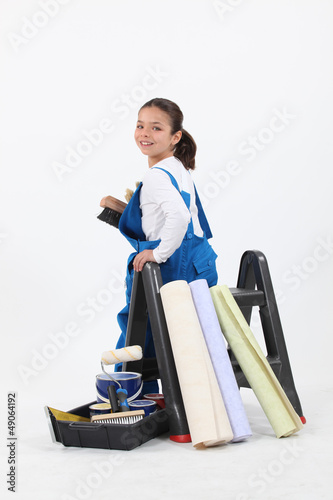 Photo: little girl dressed in house painter little girl dressed in house painter