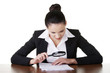 Businesswoman with magnifying glass