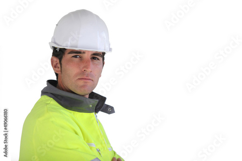 Photo: Construction worker wearing reflective jacket Construction worker wearing reflective jacket