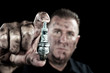 Photo: Auto mechanic and sparkplug Auto mechanic and sparkplug