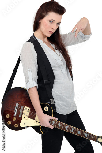 Photo: Portrait of a female guitarist Portrait of a female guitarist