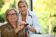 Photo: Older woman with a nurse Older woman with a nurse