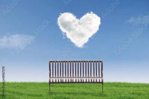 Photo: Empty chair under heart clouds Empty chair under heart clouds