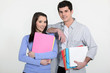Students holding folders