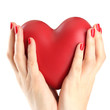 Red heart in woman hands, isolated on white