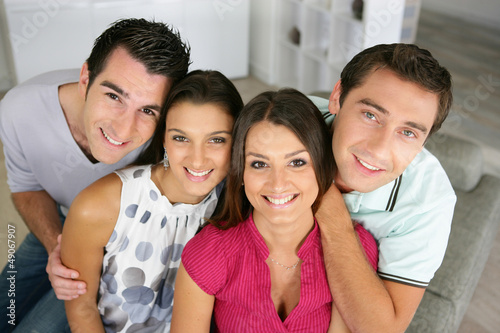 Photo: Two couples at home Two couples at home