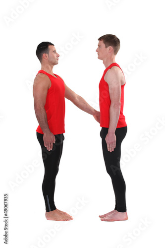 Photo: Two male gymnasts Two male gymnasts