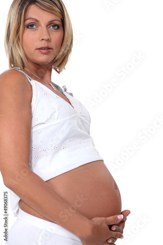 Photo: Portrait of a pregnant woman Portrait of a pregnant woman