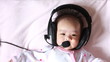 Baby enjoying to listen song