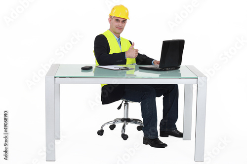 Photo: Architect sitting with computer Architect sitting with computer