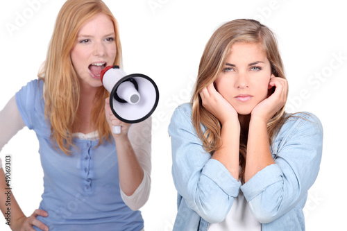 Photo: Girl shouting at friend Girl shouting at friend