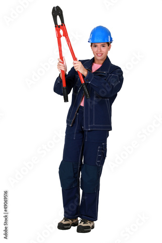 Photo: Worker with a pair of boltcutters Worker with a pair of boltcutters