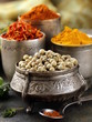 various spices (turmeric, paprika, saffron, coriander)