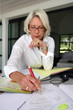 Mature woman writing