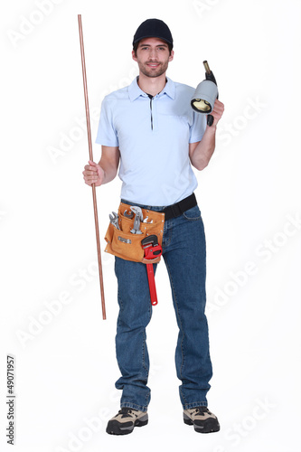 Photo: Plumber with a blowtorch Plumber with a blowtorch