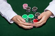 Croupier collecting in the bets