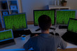Hacker sitting streaming data