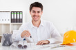 Architect working on blueprints