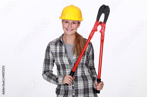Photo: Woman holding large bolt-cutters Woman holding large bolt-cutters