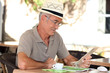 Elderly man drinking coffee
