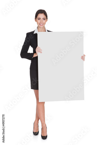Photo: Business Woman Holding Blank Placard Business Woman Holding Blank Placard
