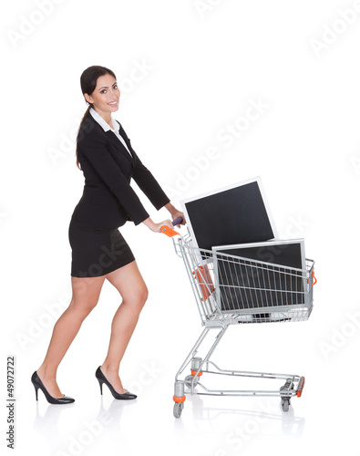 Photo: Attractive Businesswoman Shopping Lcd Monitors Attractive Businesswoman Shopping Lcd Monitors