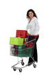 Woman with a shopping trolley full of presents
