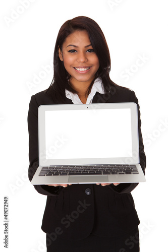 Photo: Businesswoman Presenting Laptop Businesswoman Presenting Laptop