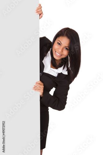 Photo: Happy Businesswoman Holding Placard Happy Businesswoman Holding Placard