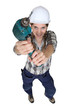 Woman holding power drill